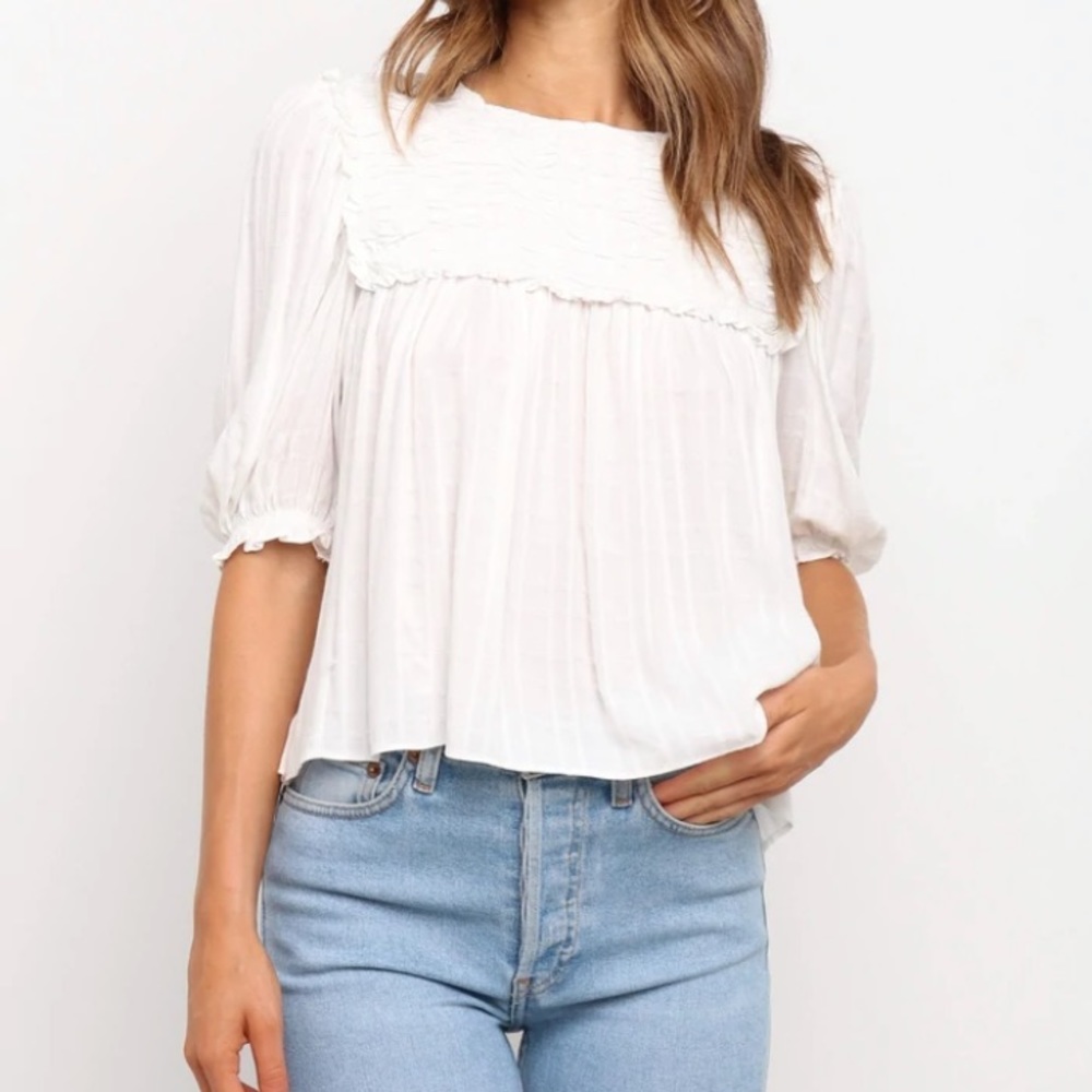 White petal and pup top